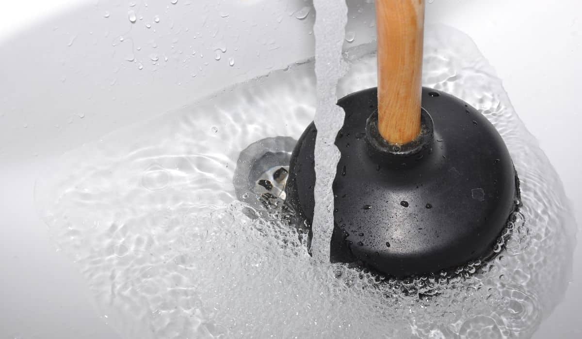 Drain Service - Plunger in Sink