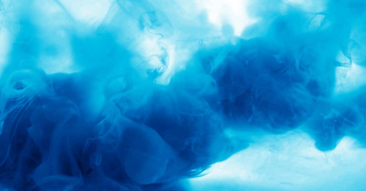Dye test showing blue water in a toilet bowl to detect a leaking toilet cistern