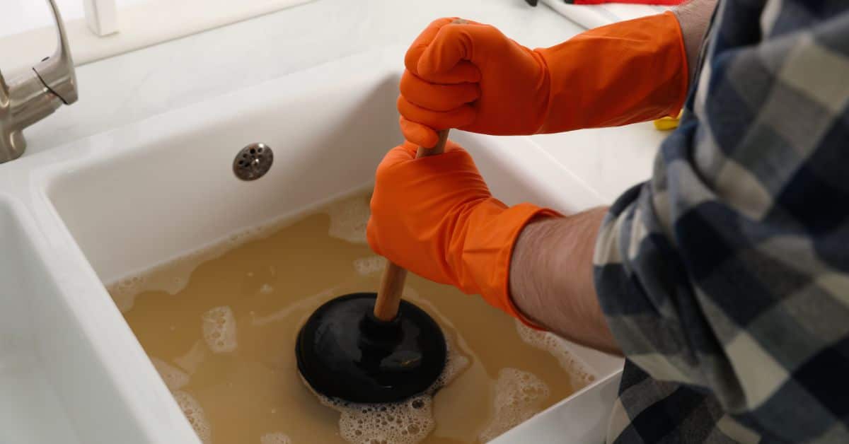 how to unblock a bathroom sink - Plunger