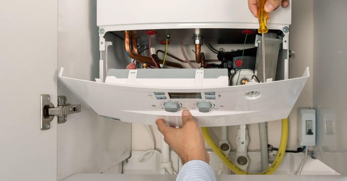 emergency heating engineer near me fixing a broken boiler