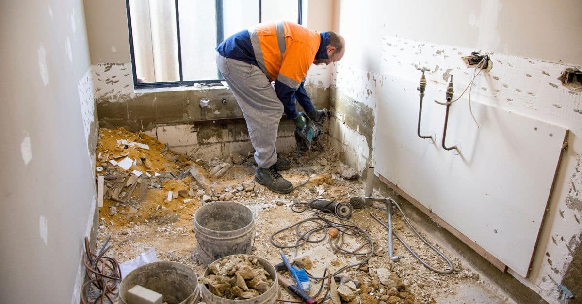 Man renovating a bathroom