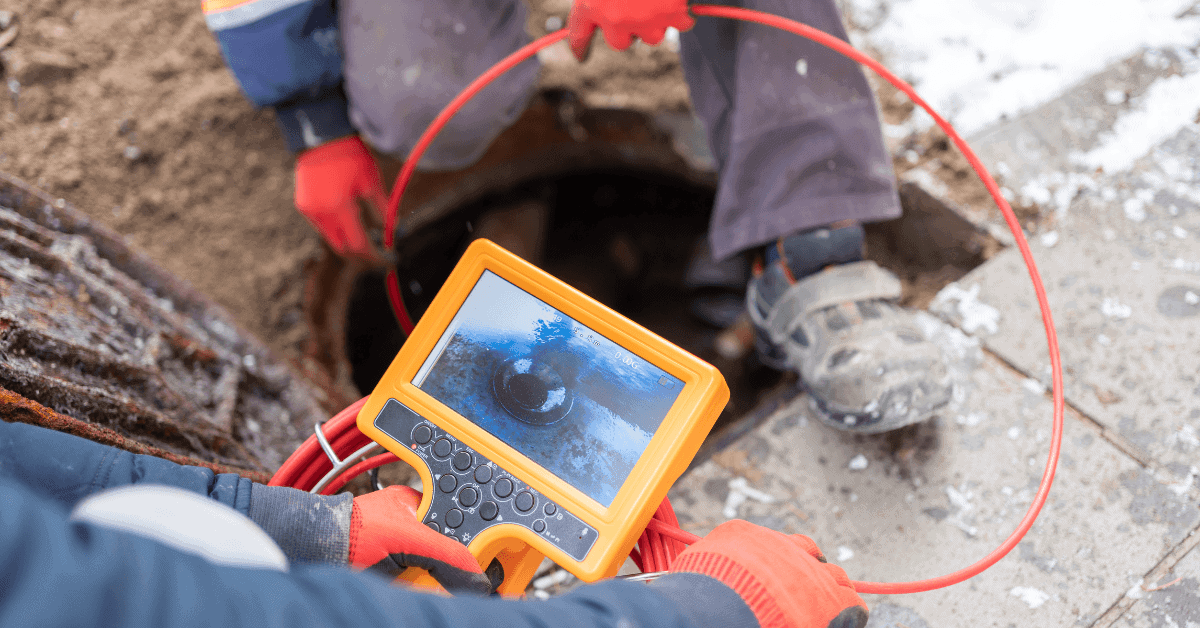 Technicians using a CCTV drain inspection on a Commercial Drainage System 