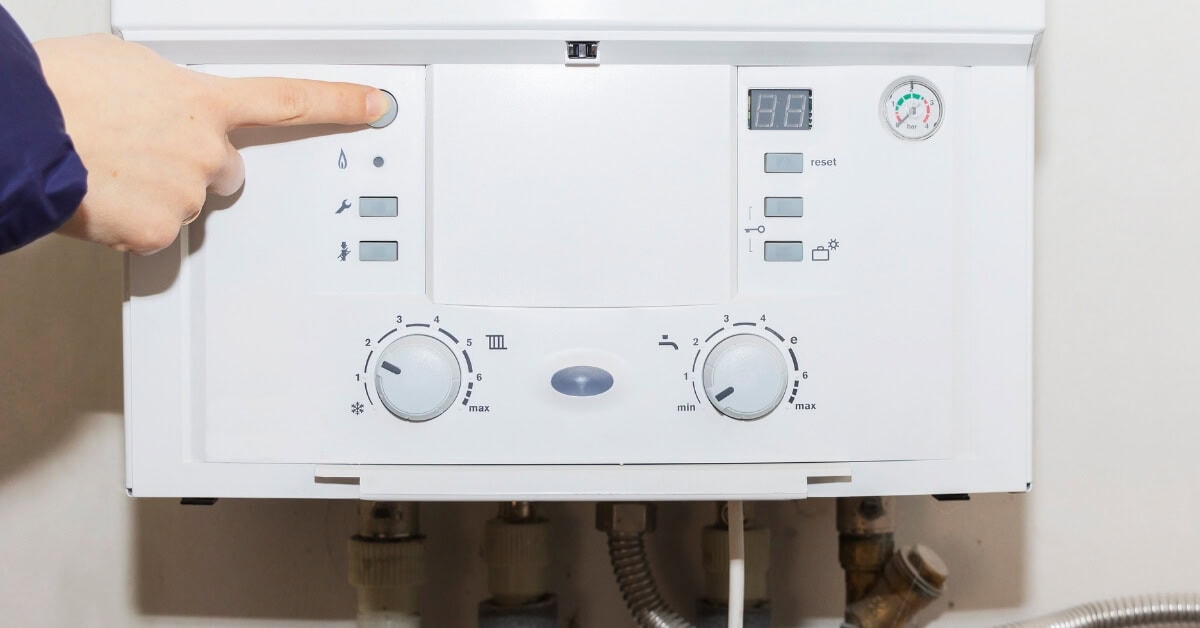 Man switching off Boiler