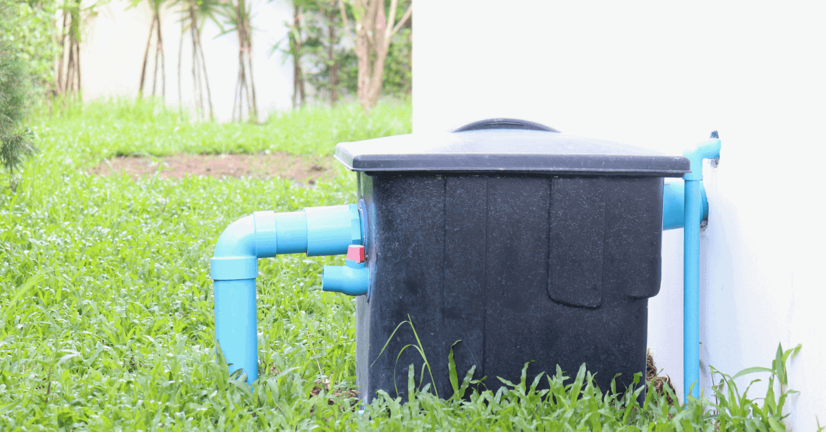 Outdoor grease trap installation connected to drainage pipes