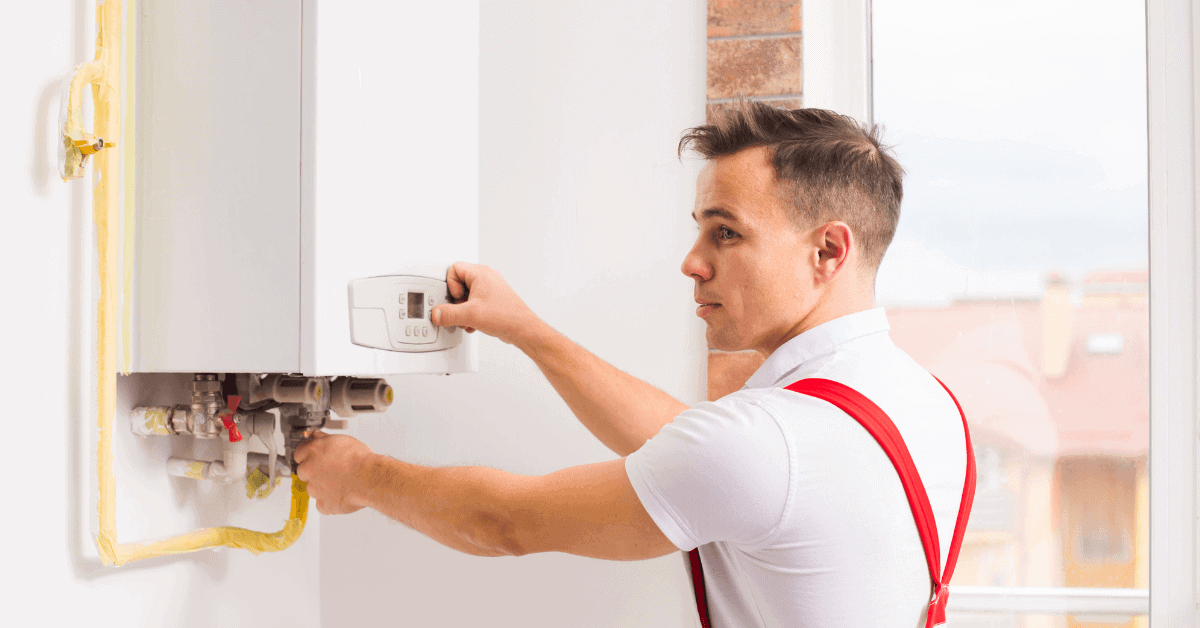 Engineer checking a domestic boiler system