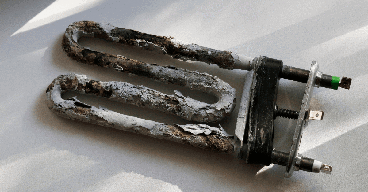 Heating element covered in heavy limescale deposits 