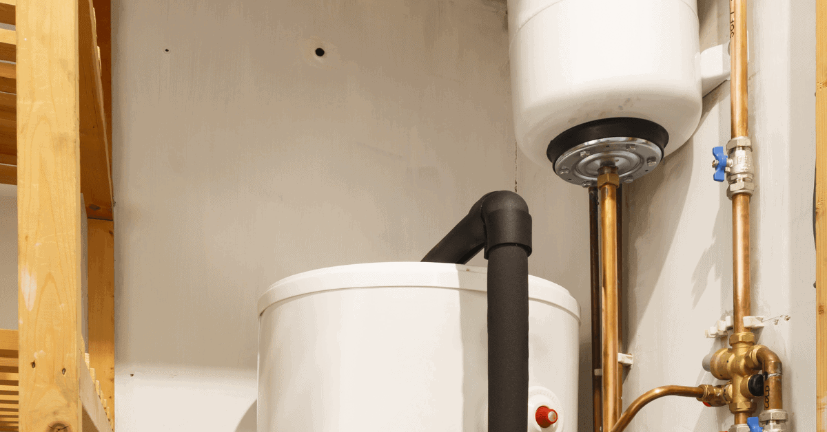 Traditional hot water cylinder and copper pipework 