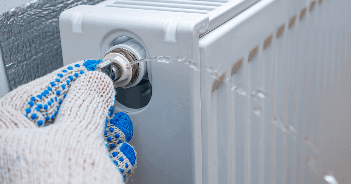 Bleeding a central heating radiator to release trapped air 