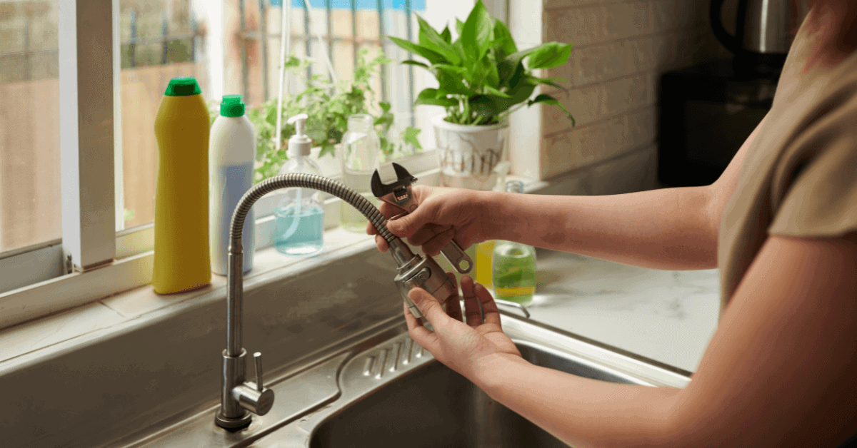 Fitting a new kitchen tap to a sink 