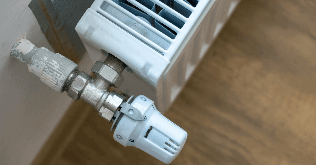 Close-up of a thermostatic radiator valve on a central heating radiator 